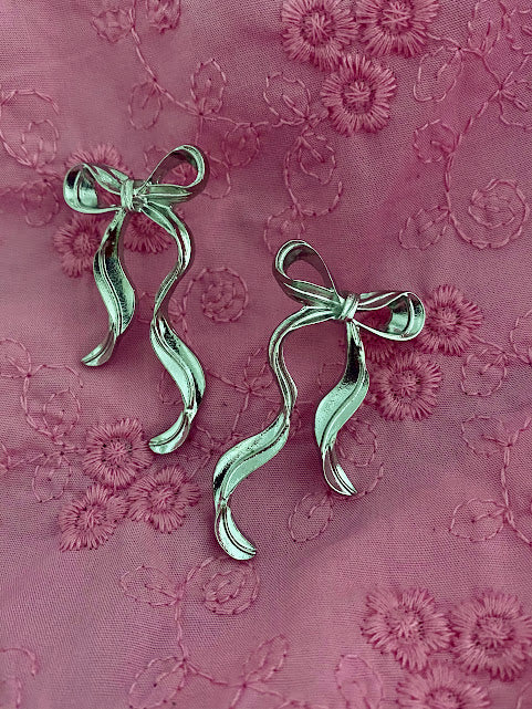 Flowing Silver Bow Earrings